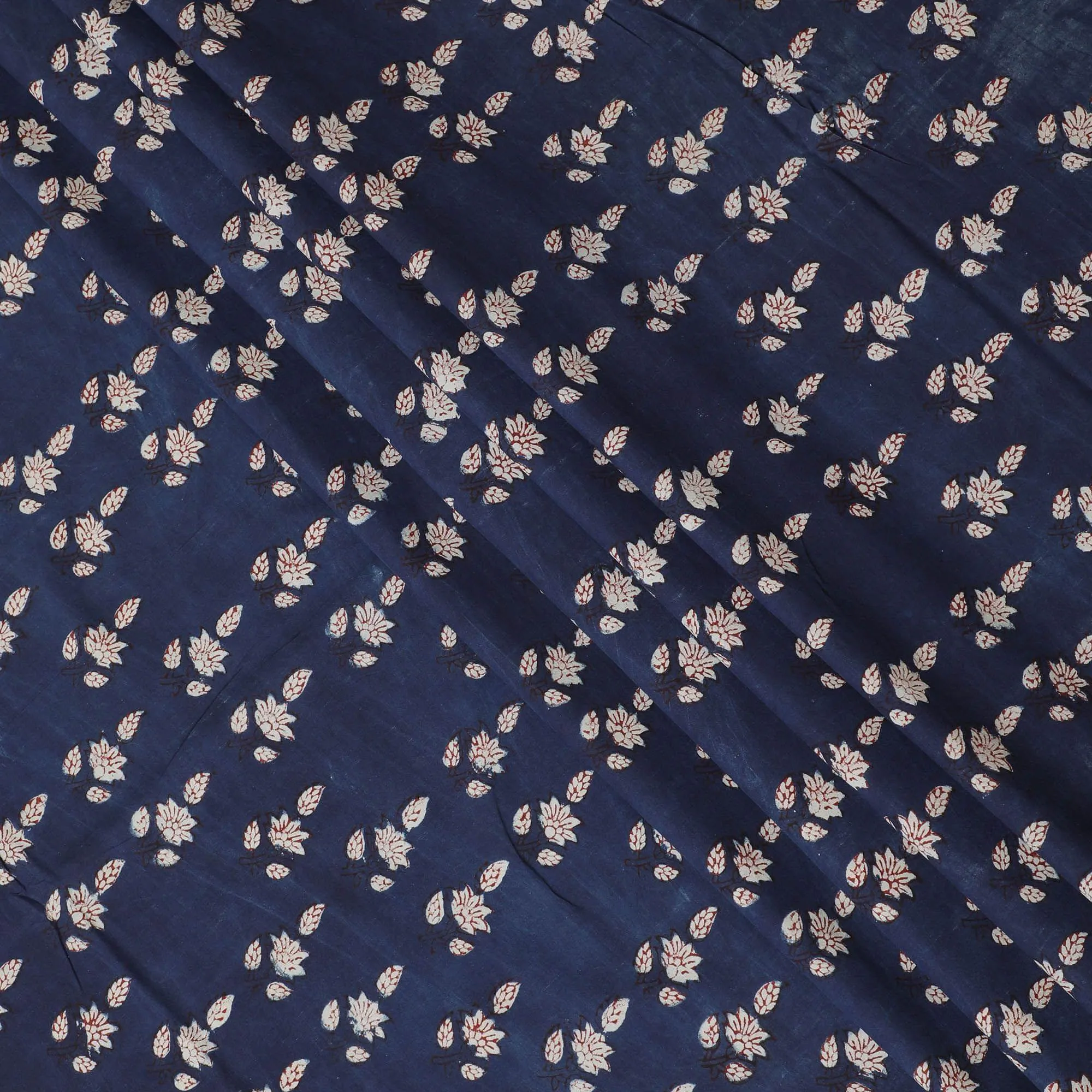 Navy blue organic cotton fabric with beige and chocolate brown print in fancy design-D13874