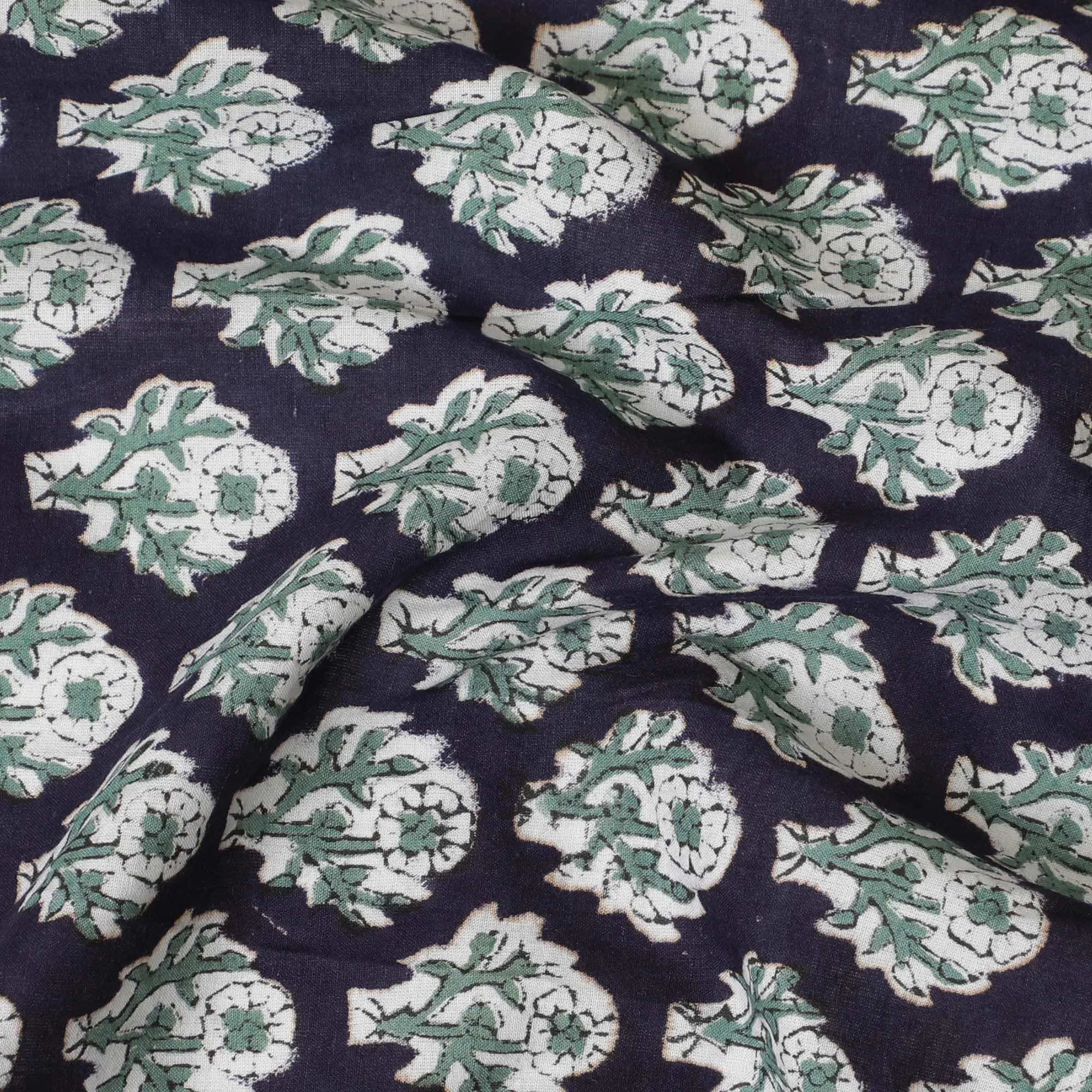 Navy blue organic cotton fabric with off white, black and turquoise green print in floral design-D13869